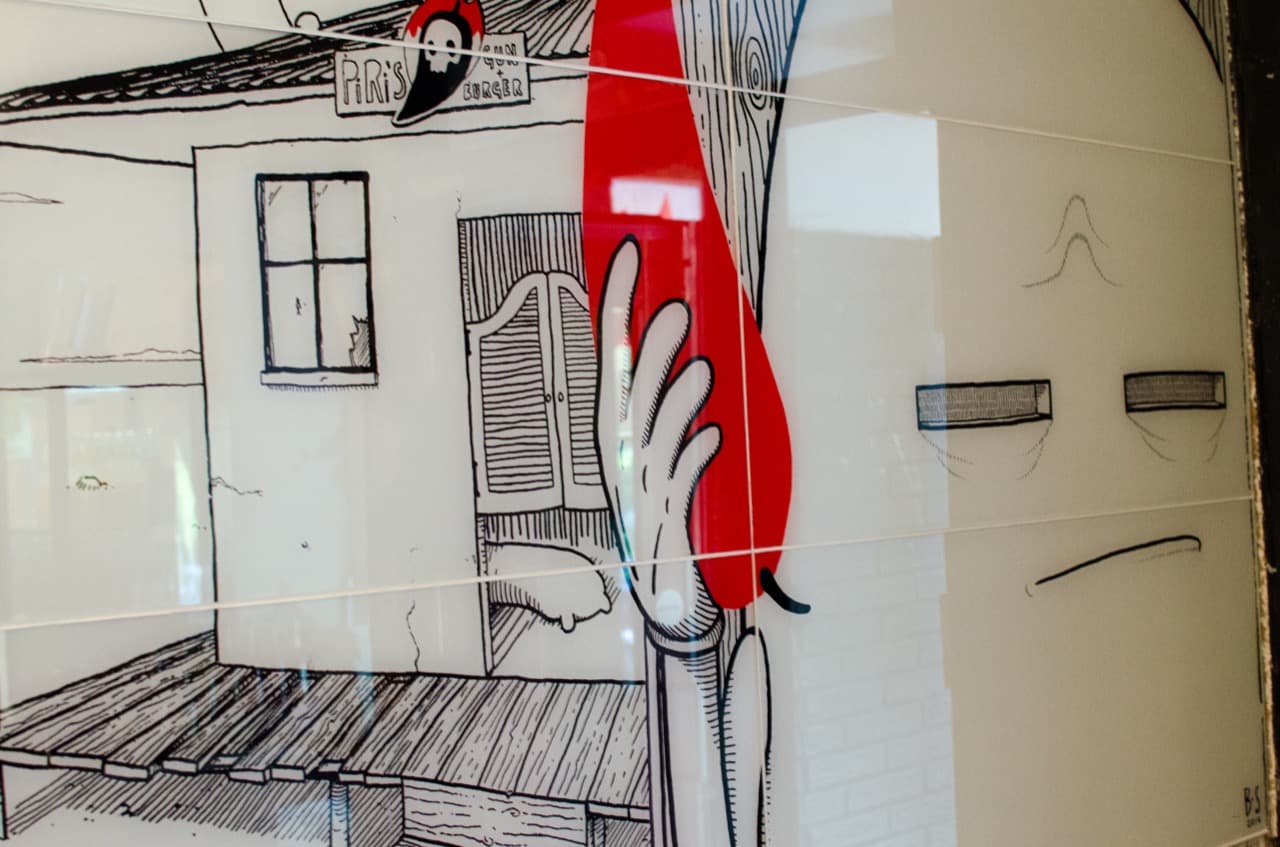 Hand-drawn graffiti art restored as UV-printed glass tile wall โ Piri's restaurant Berlin