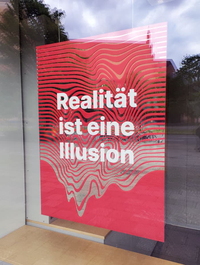 UV print on mirror for Illuseum Berlin โ floating mirror print in front windows